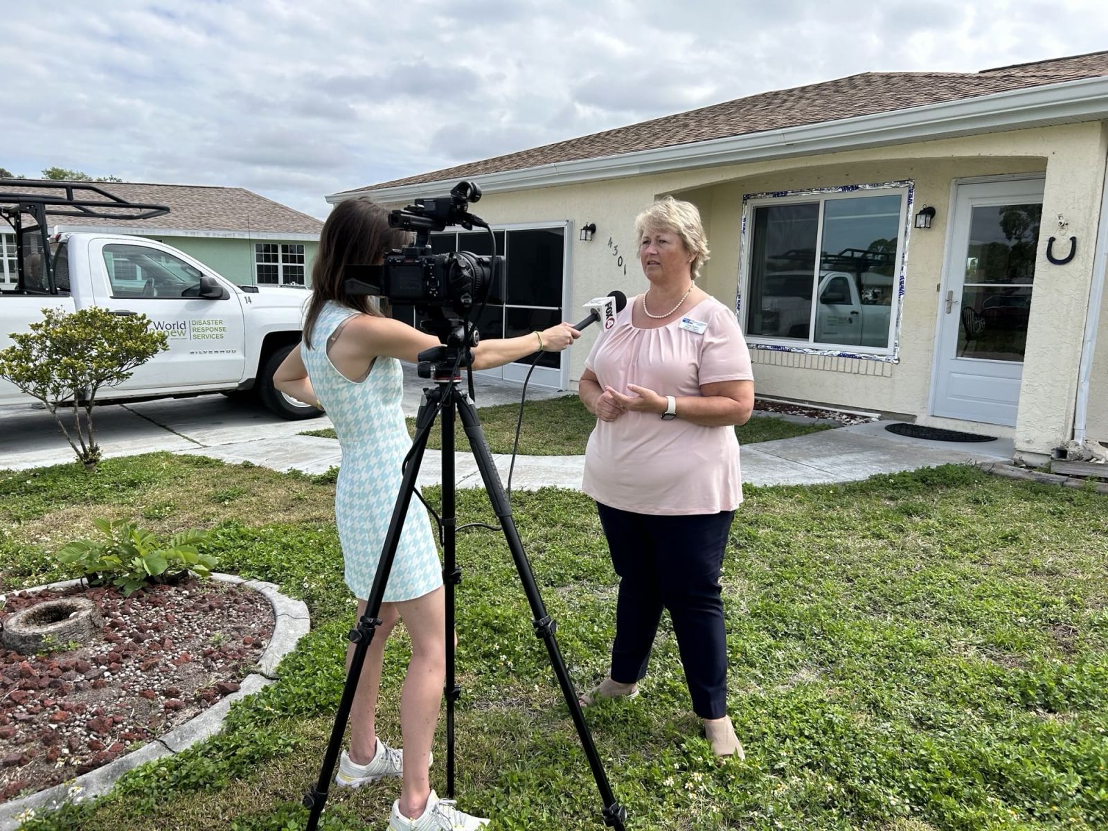 Victoria Scott, left, of Fox 4, was on the scene yesterday with United Way’s Hilda Dutton, the director of resilience and recovery, to hear how one woman would now be able to return home for the first time since 2022’s Hurricane Ian.